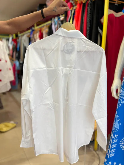 WHITE SHIRT WITH SHINY BOWS